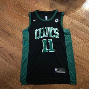 Kyrie Irving women's size M Celtics Jersey